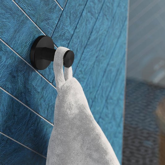 Stainless steel bathroom robe hook in matte black, sleek modern design, mounted on blue tiled wall.