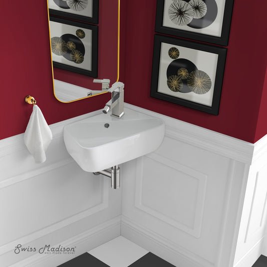 18 x 11 white ceramic wall-hung bathroom sink with right side faucet mount and chrome drainpipe.