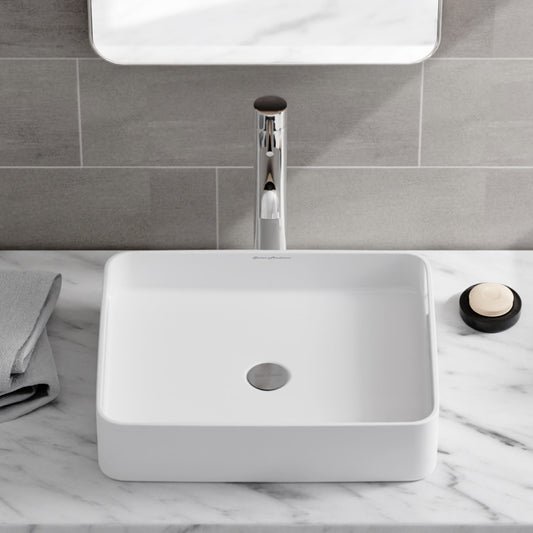 Concorde 19-inch white rectangular ceramic vessel sink with clean modern lines and center drain hole.