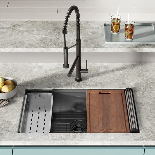 18-gauge 32" stainless steel undermount kitchen sink in polished chrome with workstation accessories.
