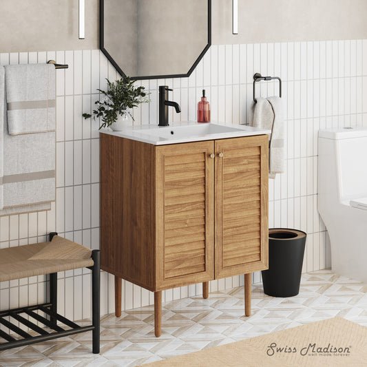 24-inch freestanding bathroom vanity in golden oak with single sink and two slatted doors.