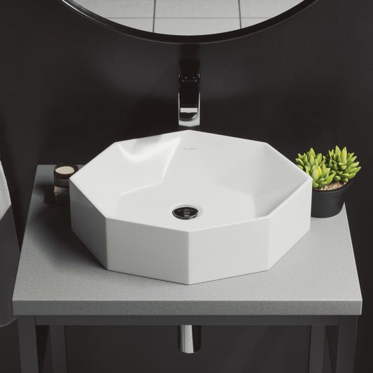Glossy white ceramic octagonal vessel sink 19.25 in with flat rim and center drain hole.