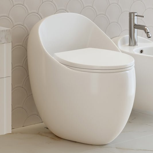 Round one-piece toilet with top flush and smooth skirted trapway in white porcelain.